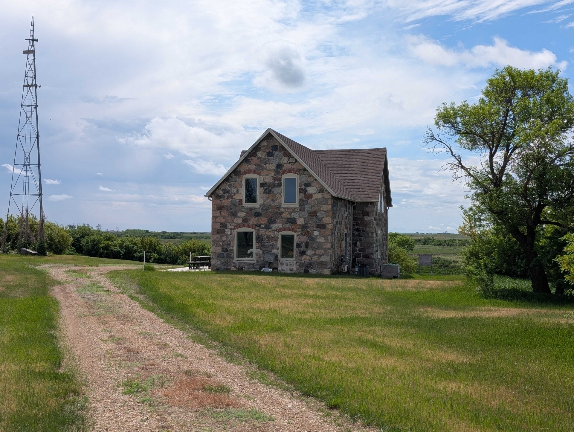 Restored stone farmhouse on the Saskatchewan prairie